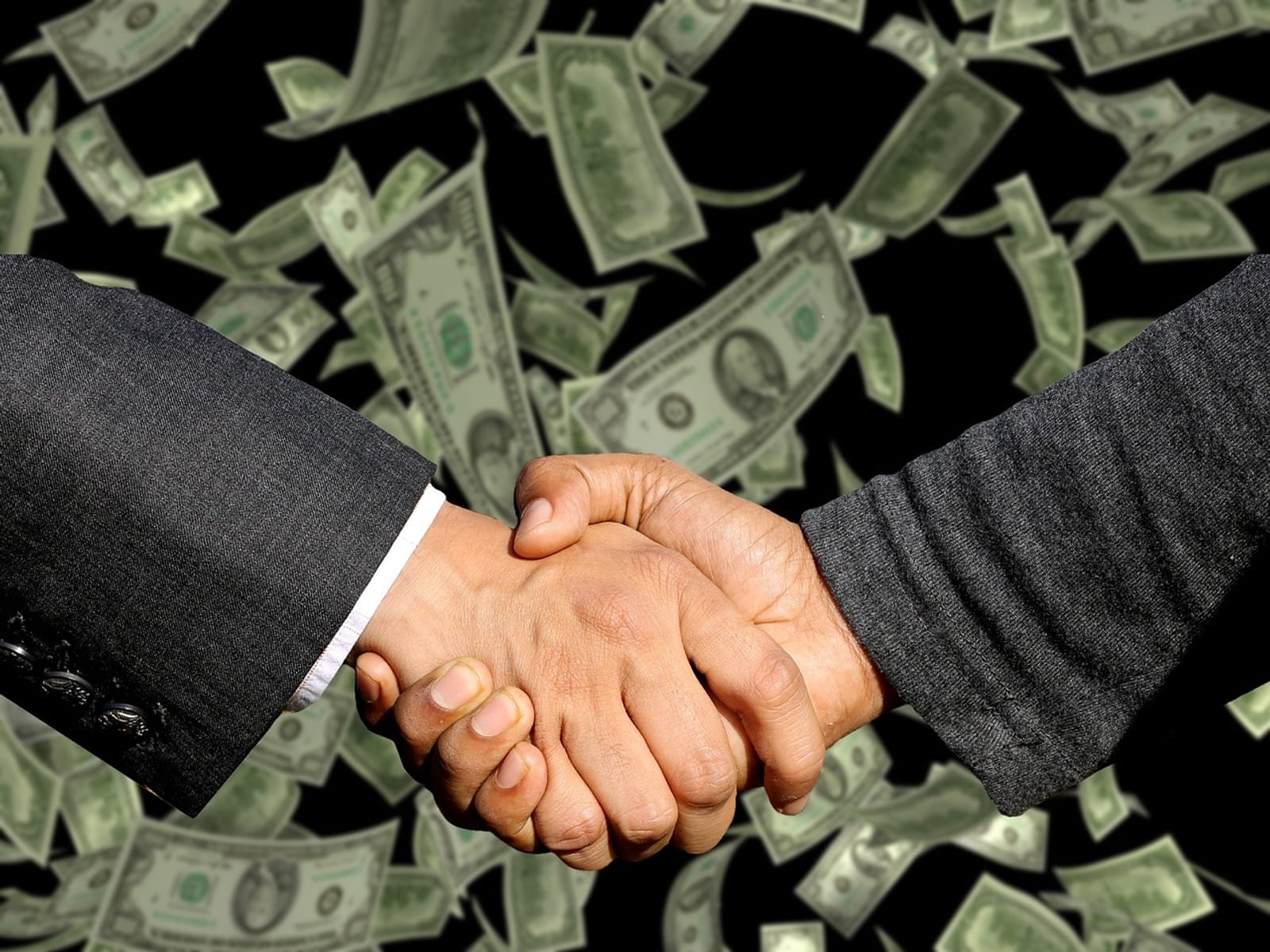 Professional business handshake representing a global partnership