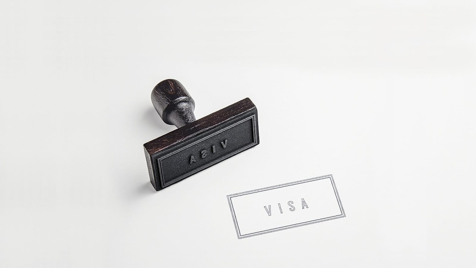 Passport with visa stamps and immigration documents