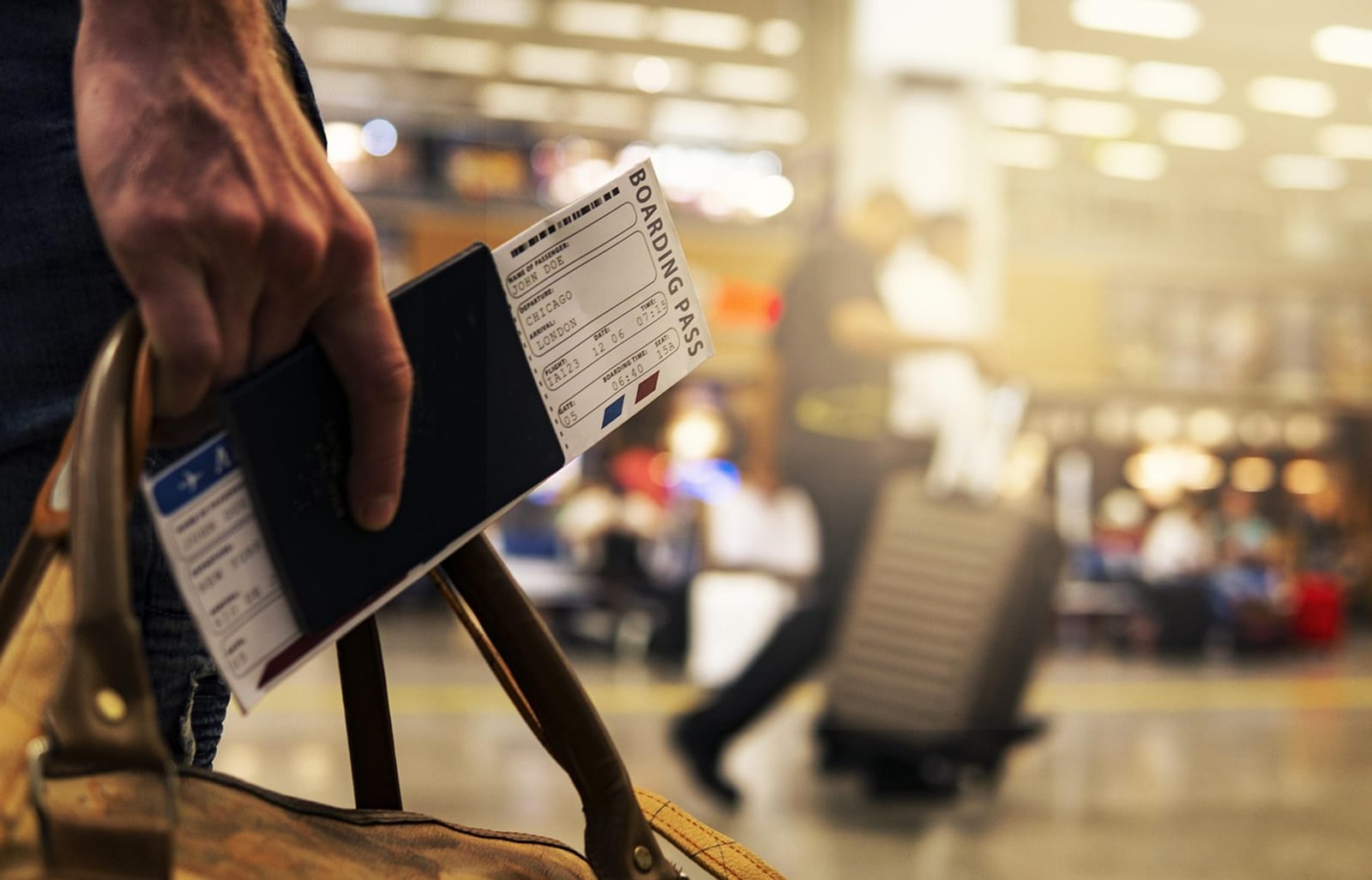 Family arriving home at airport arrivals with passports